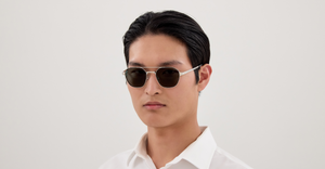 cartier 0571s 003 eckige sonnebrille in silber mit grünen gläsern