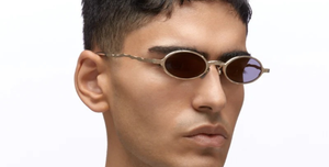 kuboraum Z24 GG ovale sonnenbrille aus metall in gold mit grauen und gold verspiegelten gläsern