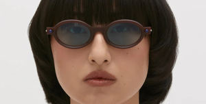 kuboraum p6 mh ovale sonnenbrille in mahagoni mit hellblauen gläsern