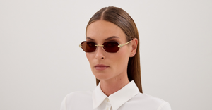 cartier CT0636S 002 eckige randlose sonnenbrille in gold mit braunen gläsern