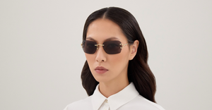 Cartier ct0644s 001 randlose sonnenbrille in gold mit grauen gläsern