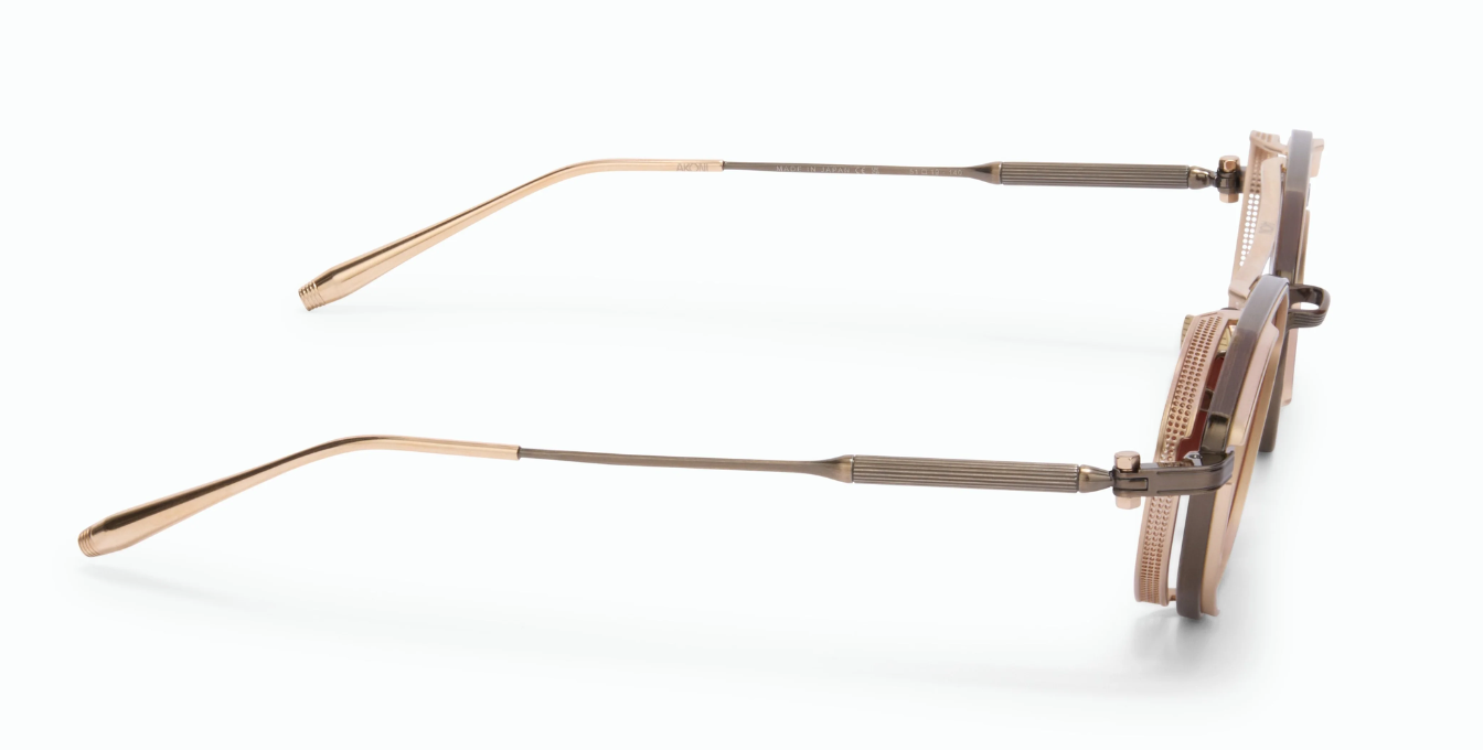 akoni eris-two antique gold eckige aviator sonnenbrille aus titan in gold mit braunen gläsern