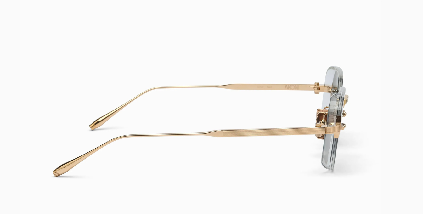 akoni juno-two crystal clear eckige sonnenbrille in transparent und gold mit grünen gläsern