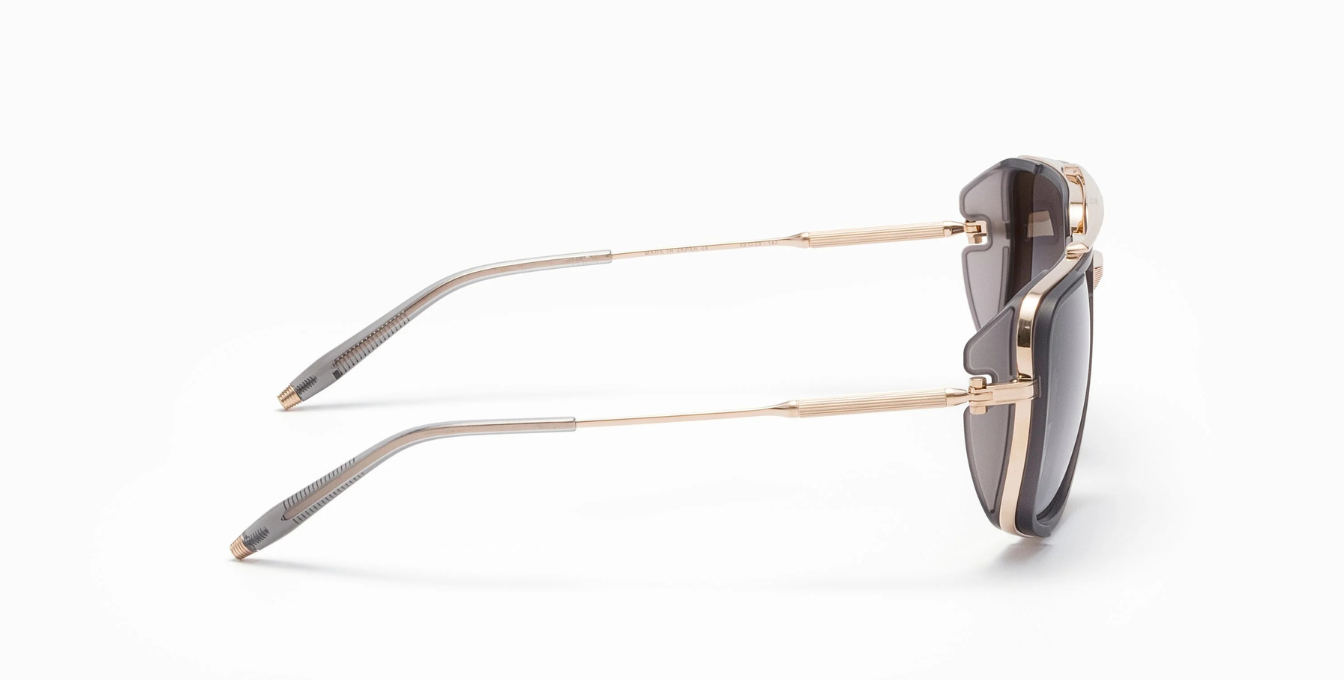 akoni stargazer brushed white gold eckige sonnenbrille in grau und gold mit grauen verlaufsgläser