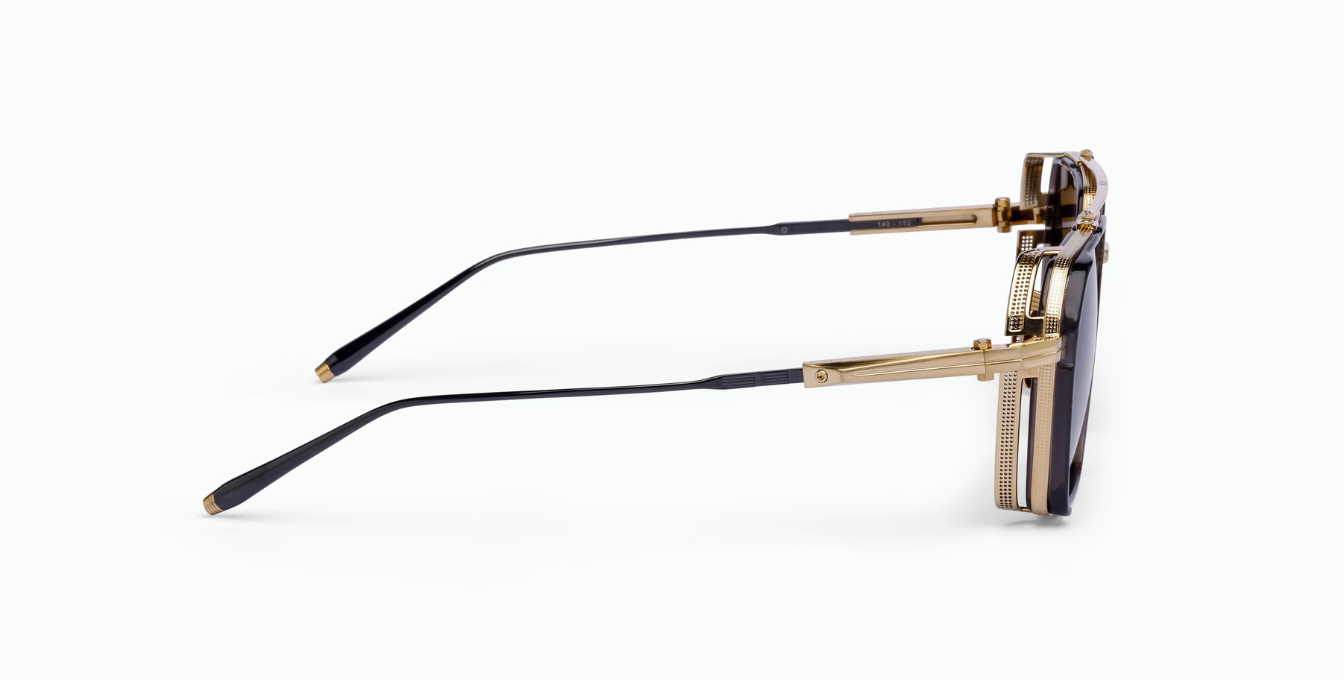 akoni tiros brushed gold eckige sonnenbrille in gold und schwarz mit grauen gläsern