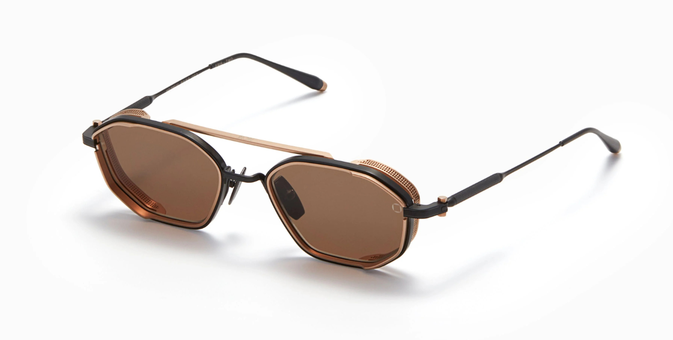 akoni eris-two brushed black ovale sonnenbrille in matt schwarz und golg mit braunen gläsern