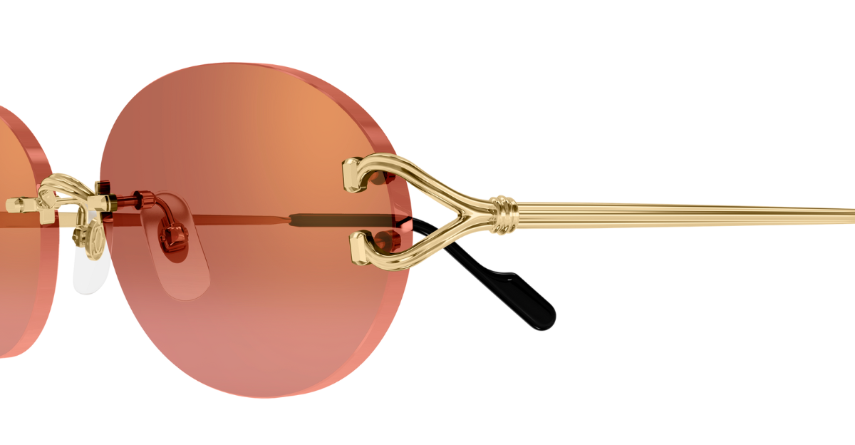 cartier 0551S 005 ovale randlose sonnenbrille in gold mit roten gläsern