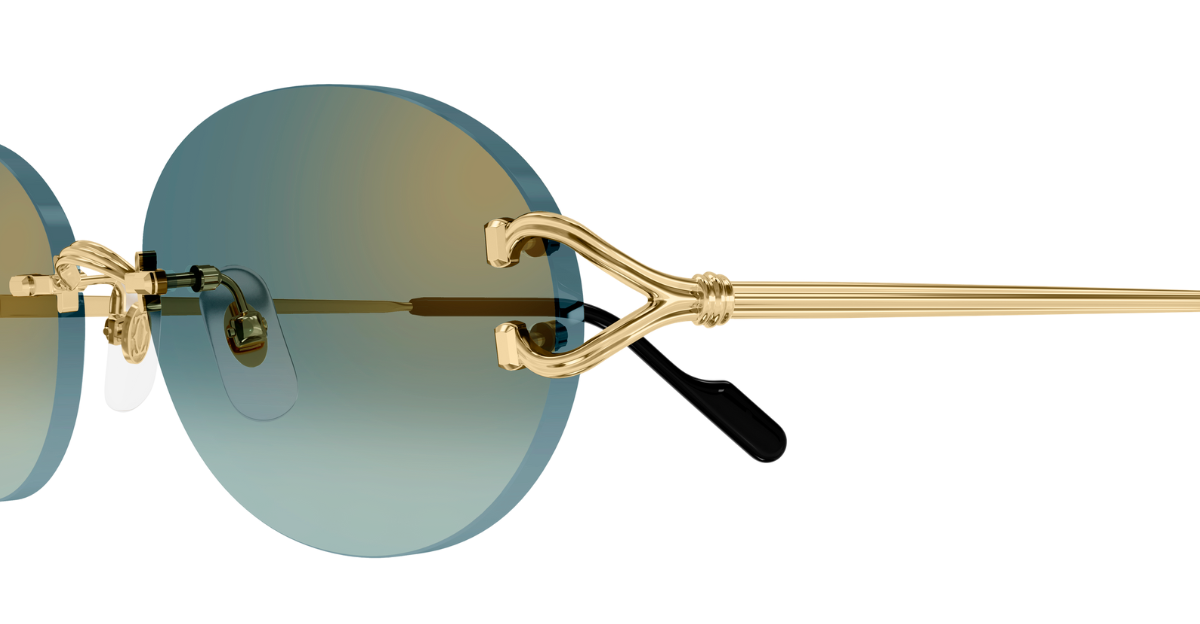cartier 0551S ovale sonnenbrille in gold mit grünen gläsern