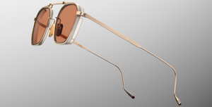 jacques marie mage baudelaire 2 darjeeling eckige sonnenbrille aus titan und acetat in gold und taupe mit orangenen gläsern