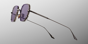 jacques marie mage verlaine corbeau titansonnenbrille in schwarz und silber mit grauen gläsern