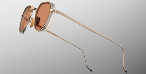 jacques marie mage dixon darjeeling pantoförmige sonnenbrille aus titan und acetat in gold und taupe mit orangenen gläsern