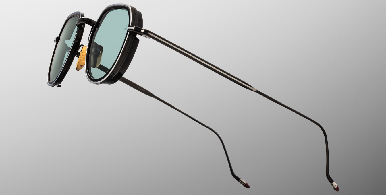 jacques marie mage dixon paon pantoförmige sonnenbrille aus titan und acetat in schwarz und silber mit türkisenen Gläsern