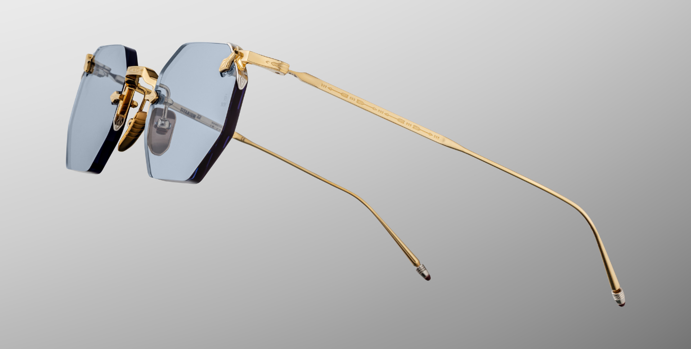 jacques marie mage el dorado ciel achteckige randlose sonnenbrille in gold mit blauen gläsern