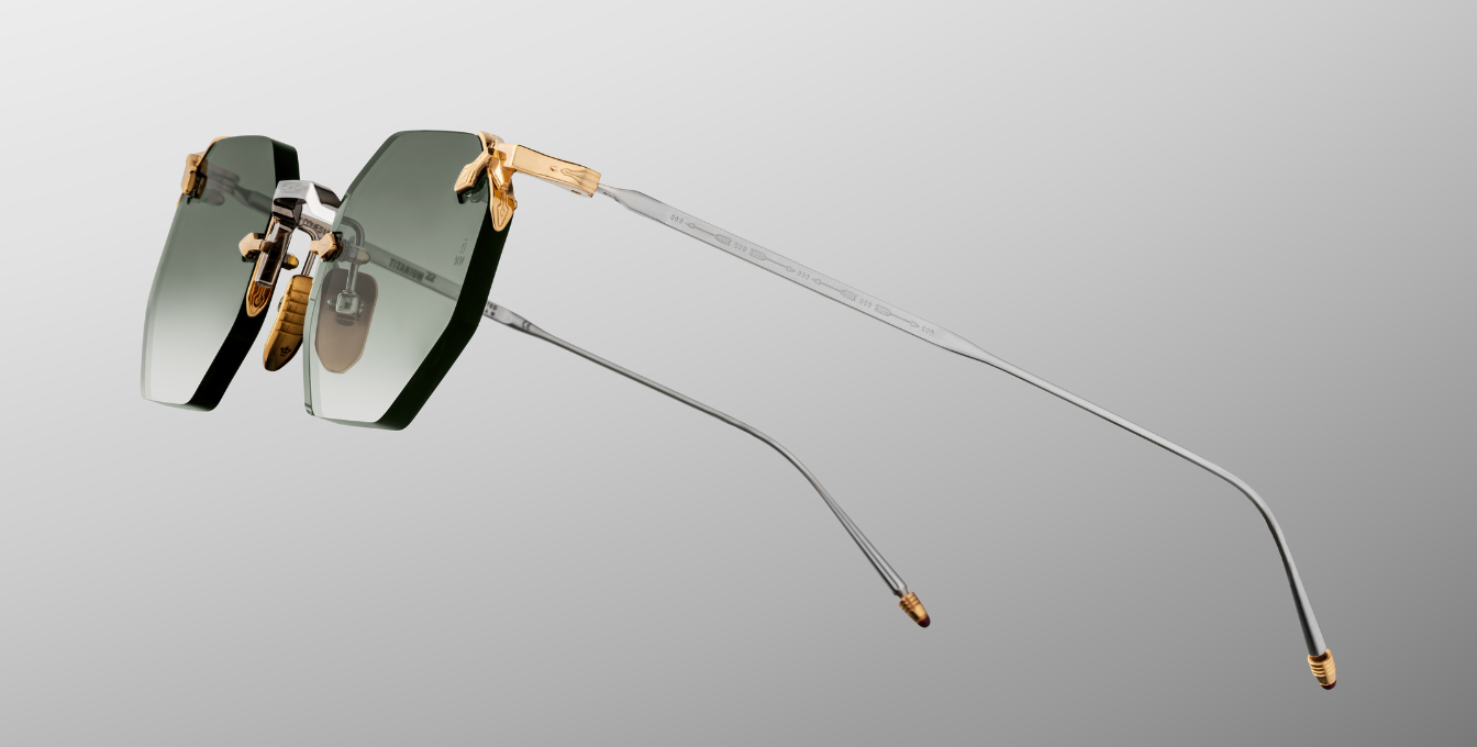 jacques marie mage eldorado electrum achteckige randlose sonnenbrille in silber und gold mit blauen gläsern