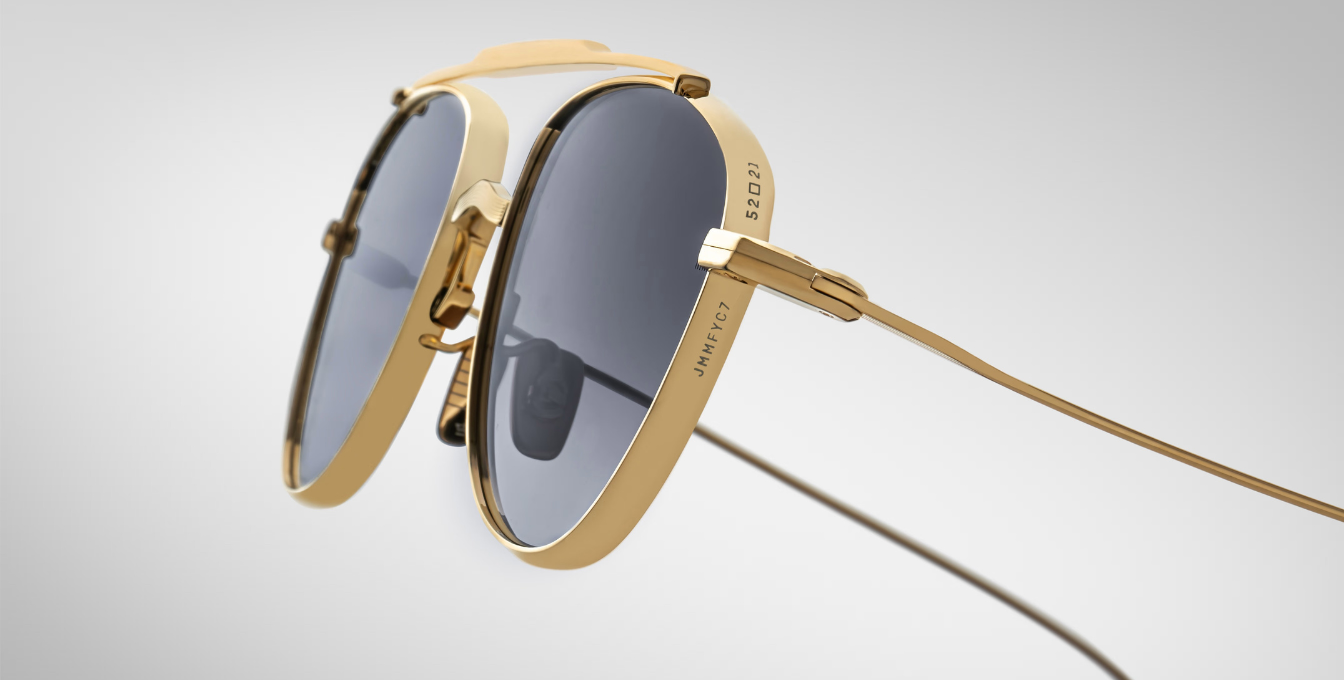 jacques marie mage flynn cia aviator sonnenbrille aus titan in gold mit grauen verlaufsgläsern