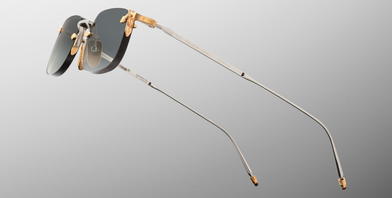 jacques marie mage fonda electrum eckige randlose sonnenbrille aus titan in silber und gold mit grünen verlaufsgläser