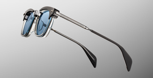 jacques marie mage kennedy sulfur eckige sonnenbrille in transparent und grau mit blauen gläsern