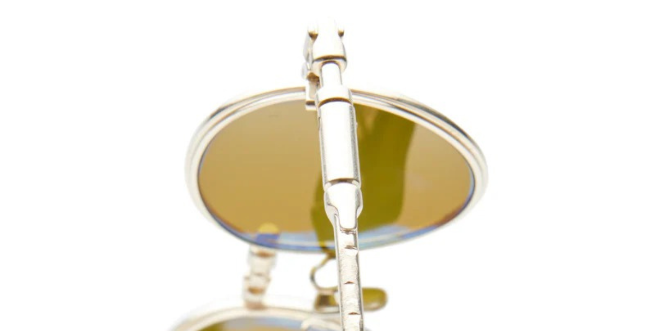 kuboraum h67 gd pantoförmige sonnenbrille aus titan in gold mit grünen gläsern