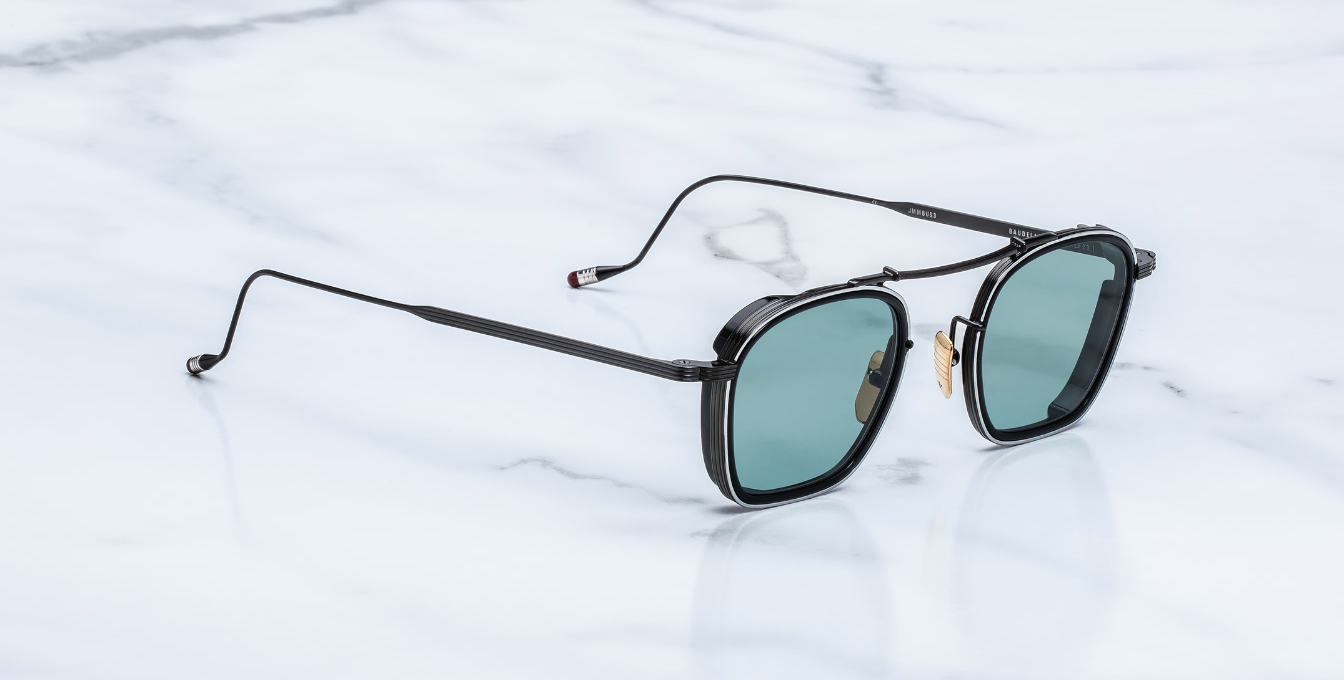 jacques marie mage baudelaire 2 paon eckige sonnenbrille aus titan und acetat in schwarz und silber mit türkisen gläsern