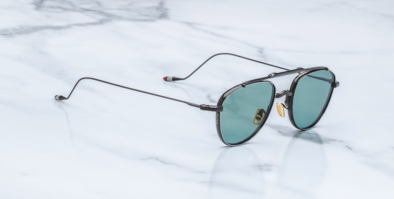 jacques marie mage flynn paon aviator sonnenbrille aus titan in schwarz mit türkisen gläsern
