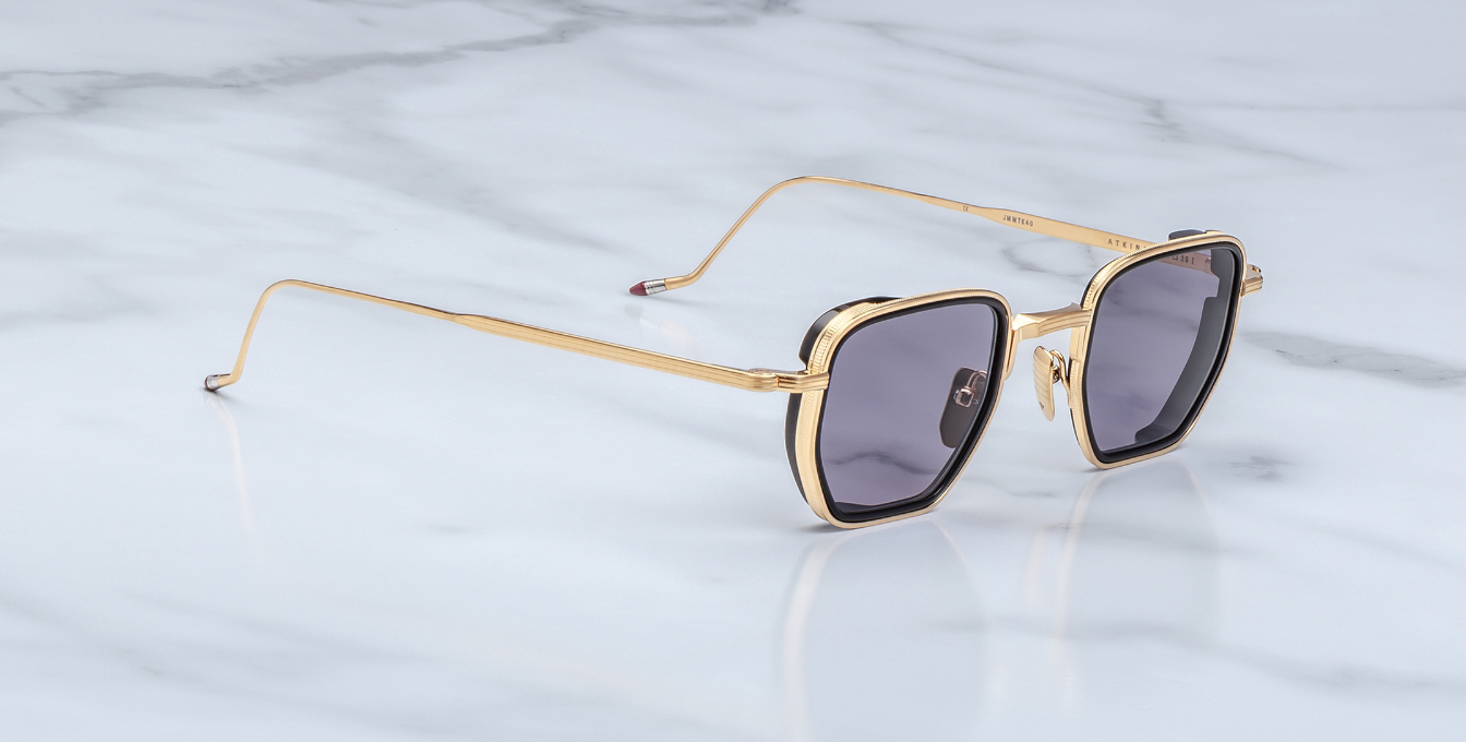 jacques marie mage atkins gold eckige sonnenbrille in gold und schwarz mit violetten gläsern
