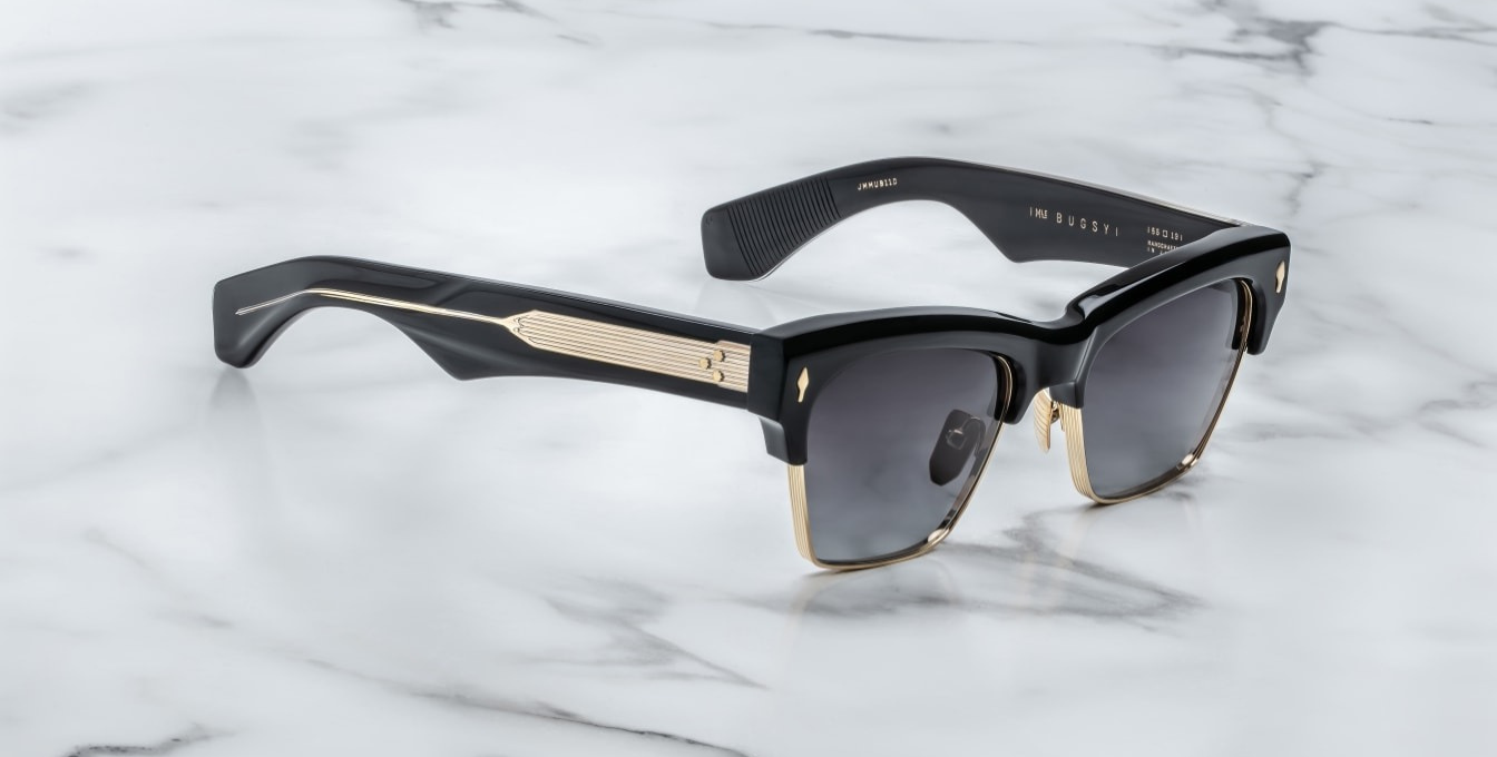 jacques marie mage bugsy ecplise2 cateye sonnenbrille in schwarz und gold mit dunkel grauen verlaufsgläsern