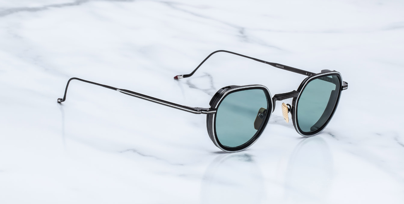 jacques marie mage dixon paon pantoförmige sonnenbrille aus titan und acetat in schwarz und silber mit türkisenen Gläsern