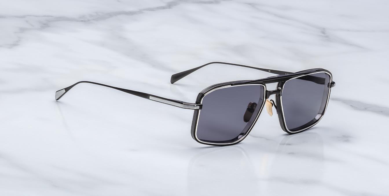 jacques marie mage earl corbeau eckige sonnenbrille in schwarz und silber mit grauen gläsern