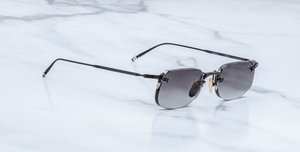 jacques marie mage fonda black eckige randlose sonnenbrille in schwarz und silber mit grauen verspiegelten verlaufsgläsern