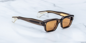 jacques marie mage jeff london eckige sonnenbrille in transparentem braun mit orangenen gläsern