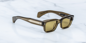 jacques marie mage jeff volvox eckige sonnenbrille in transparentem grün mit olive farbenen gläsern
