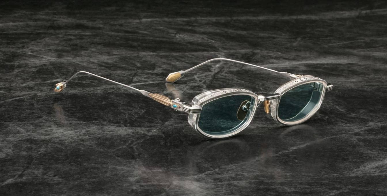 jacques marie mage last frontier hardin gaia ovale sonnenbrille in silber und gold mit transparenten Acetat und hellblauen gläsern