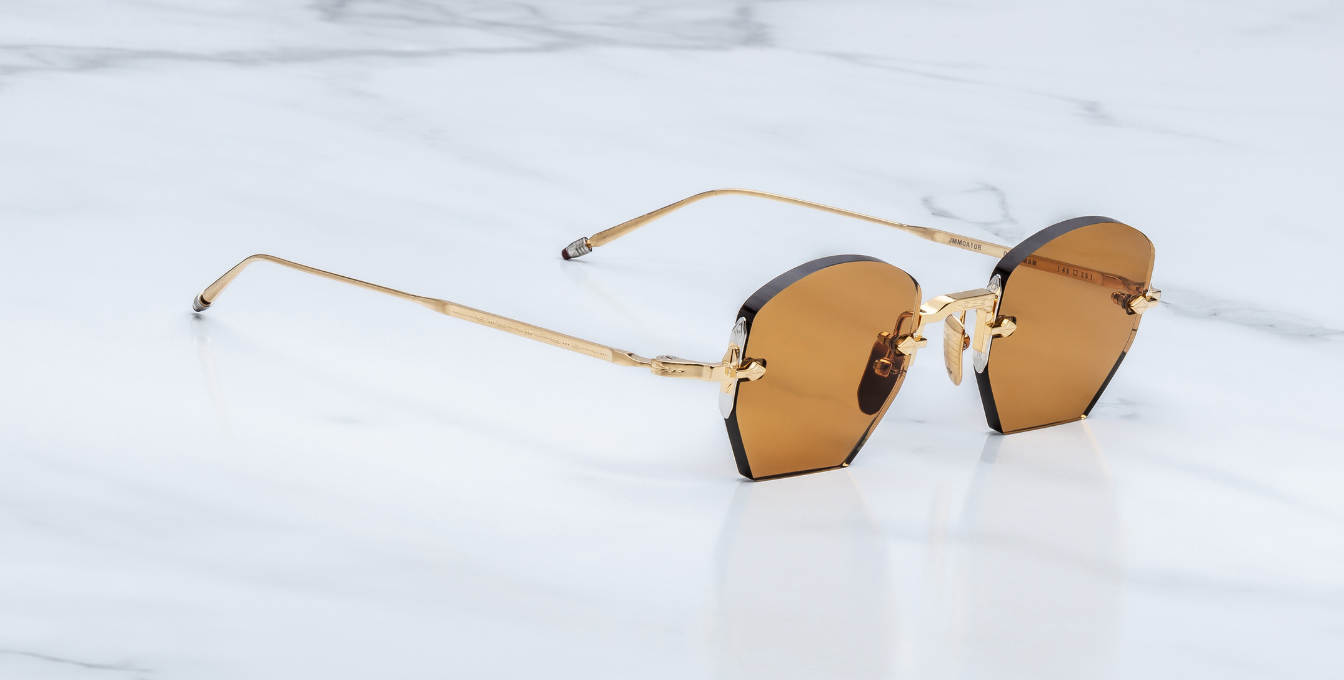 jacques marie mage oatman suntan randlose sonnenbrille in gold mit orangenen gläsern
