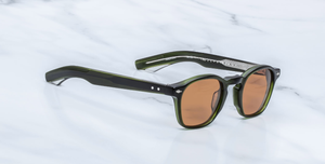 jacques marie mage zephirin 47 borneo eckige sonnenbrille aus acetat in grün mit orangenen gläsern