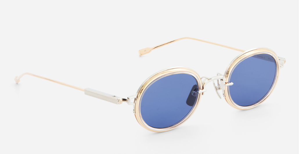 Sato Acamar II P/RG-1 ovale sonnenbrille aus titan n platinum und rose gold mit blauen gläsern
