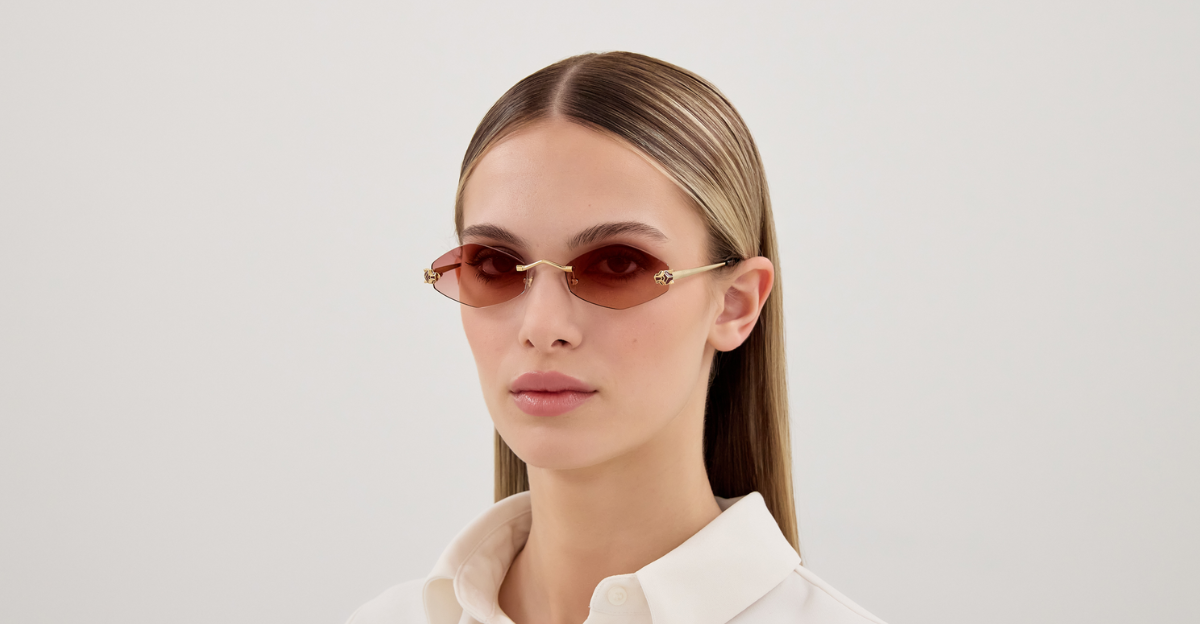 cartier 0433s 006 sechseckige randlose sonnenbrille in gold mit roten verspiegelten gläsern
