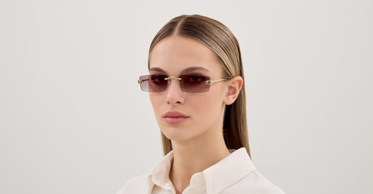 cartier 0598s 005 eckige rahmenlose sonnenbrille in gold mit violetten gläsern